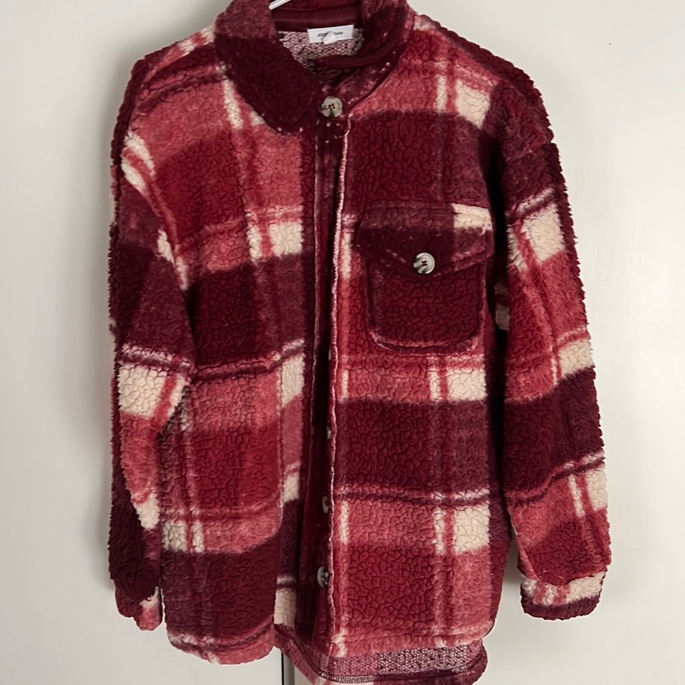 Multicolor, plaid sherpa, fluffy outside.